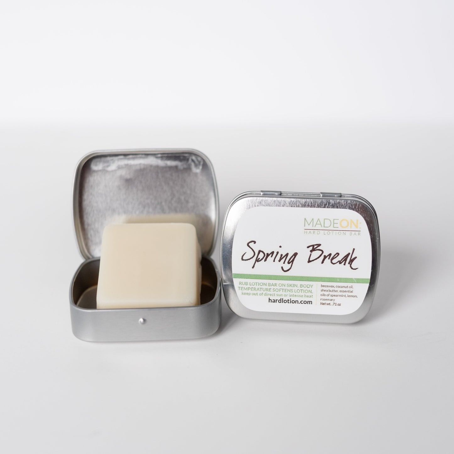 scented lotion bar on white background