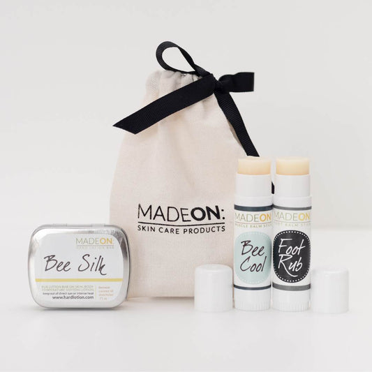 gift back with Beesilk lotion bar for dry skin, BeeCool Muscle Rub Lotion Stick and Foot Rub Lotion Stick, against white background