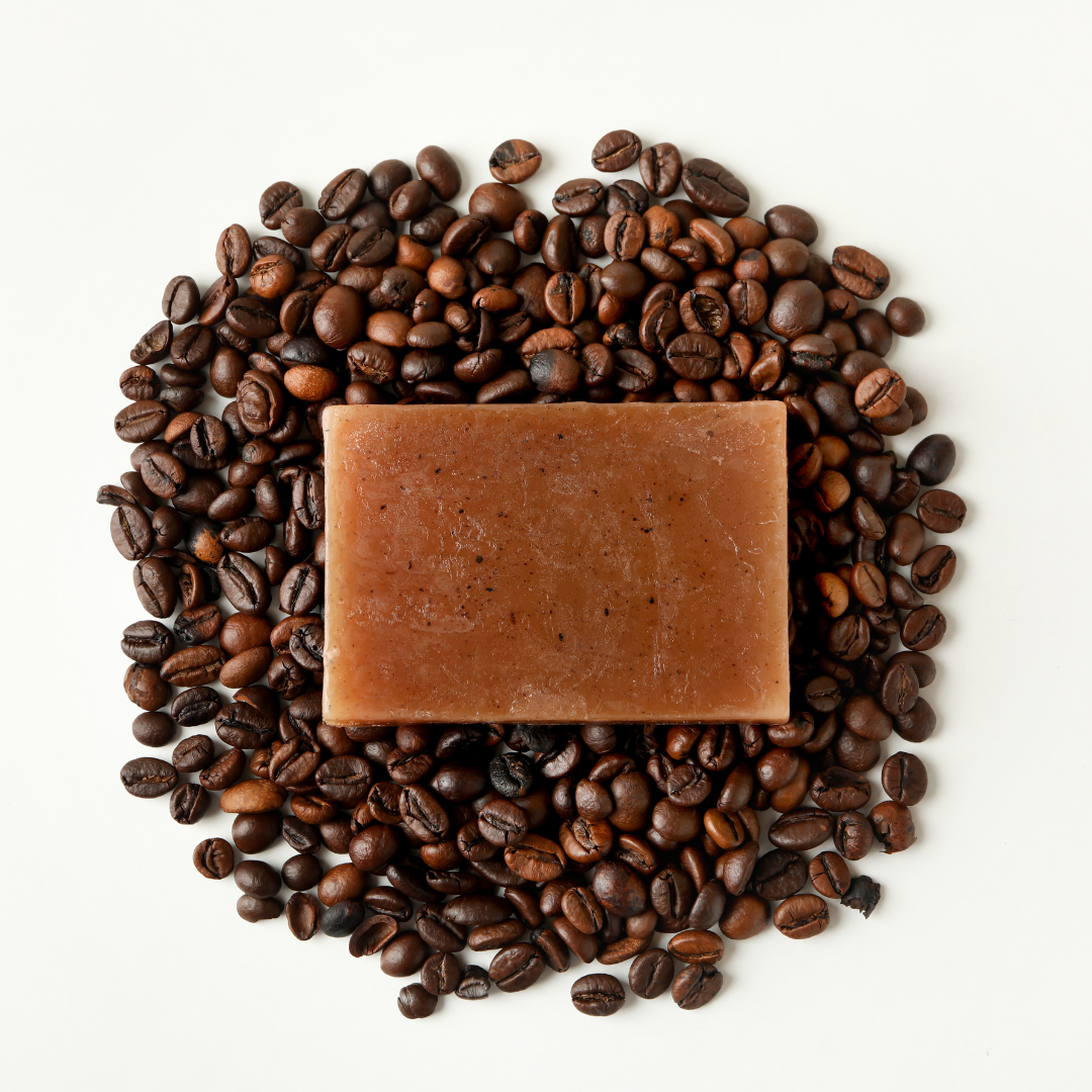 coffee goat milk soap lying on coffee beans