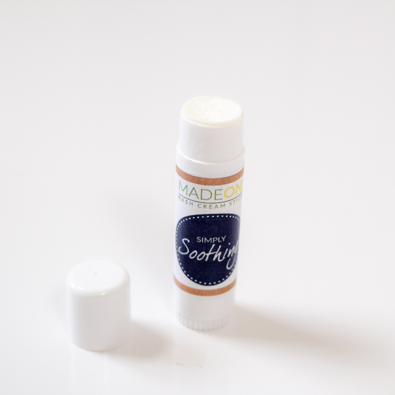 Glue stick size stick of Simply Soothing Rash Cream with white background for adults, children or babies