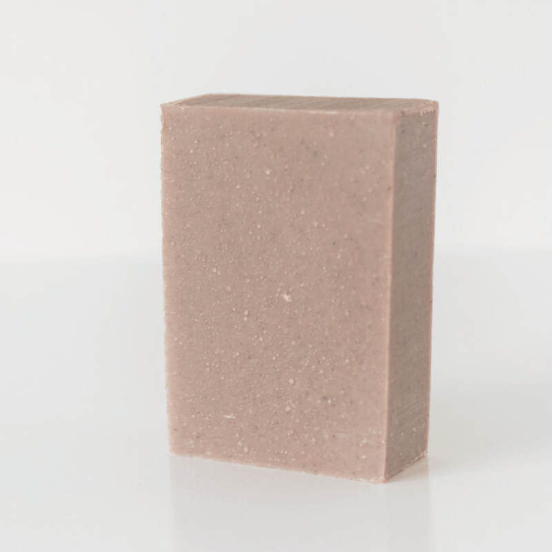 soap that could be coffee or pumice or plain on white background