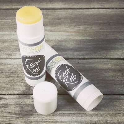 Two glue-sized tubes of foot rub lotion stick emollient for dry, cracked skin