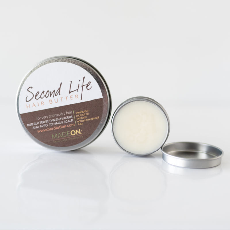 two tins in two sizes of second life hair butter for curly hair