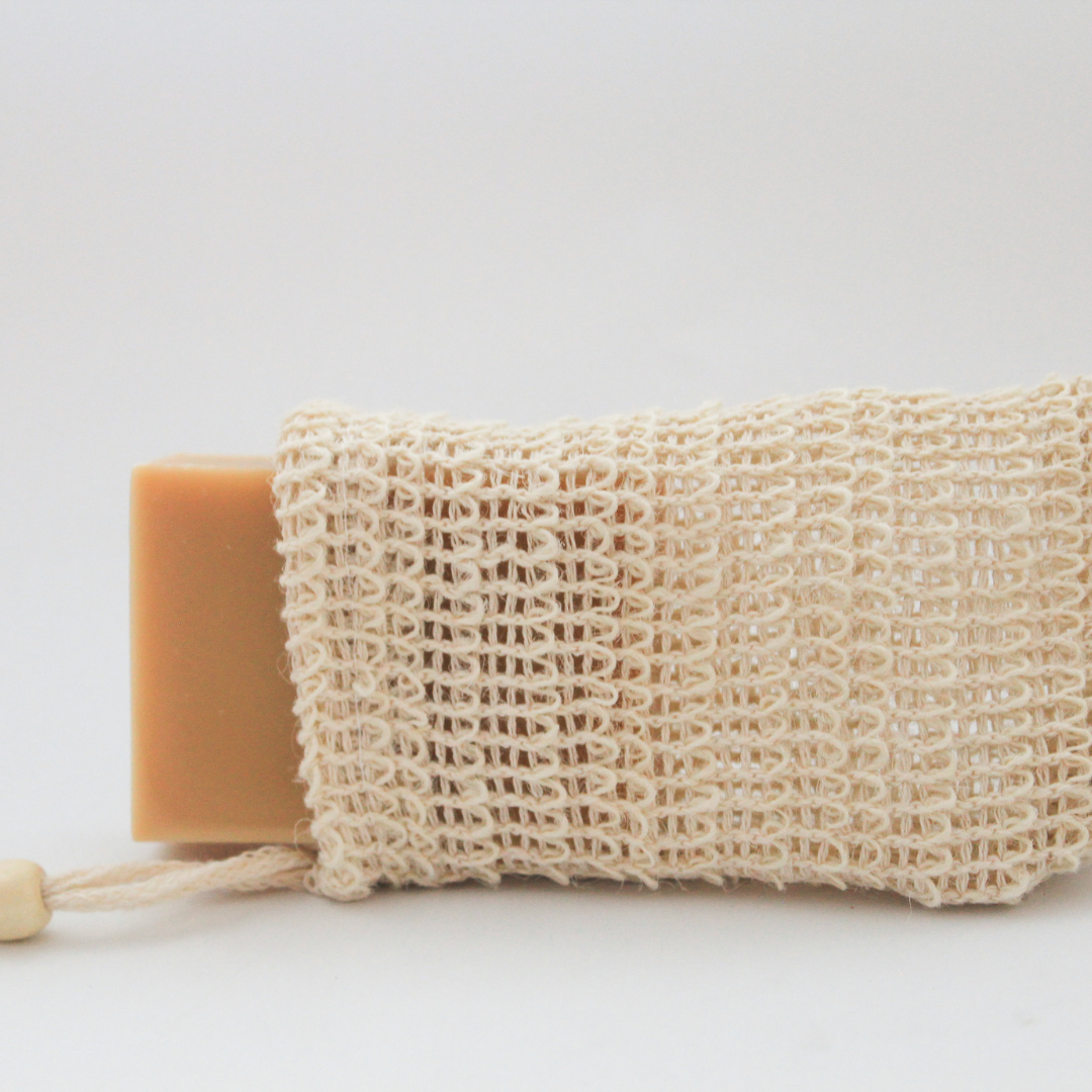 mesh soap bag with bar of soap